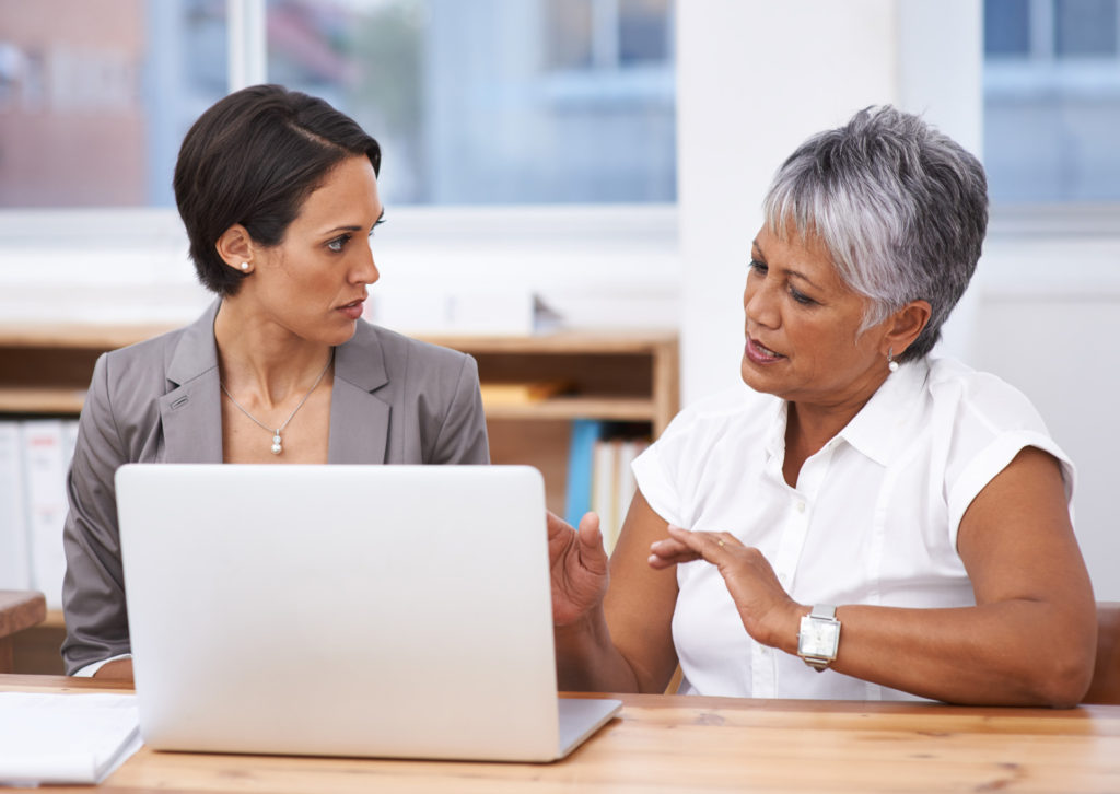 Woman Entrepreneur with Counsellor talking about Access Capital