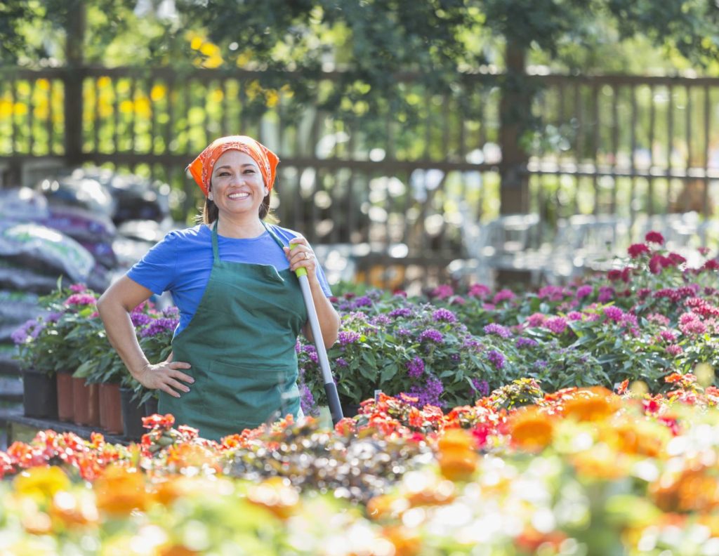 Business Woman Posing at Plant Nursery